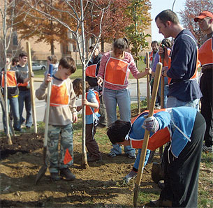 TreeVitalize volunteers help at an
East Liberty planting.