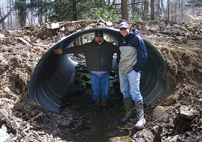 WPC’s Tye Desiderio, watershed program GIS specialist (left) and Brian Neal, watershed program
projects manager, helped install culverts this year that allow the streams to flow more naturally.