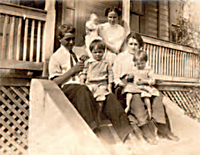 Levi Tissue and his family at their farmhouse.