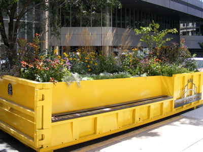 The mobile parklet in Downtown Pittsburgh is filled with flowers.