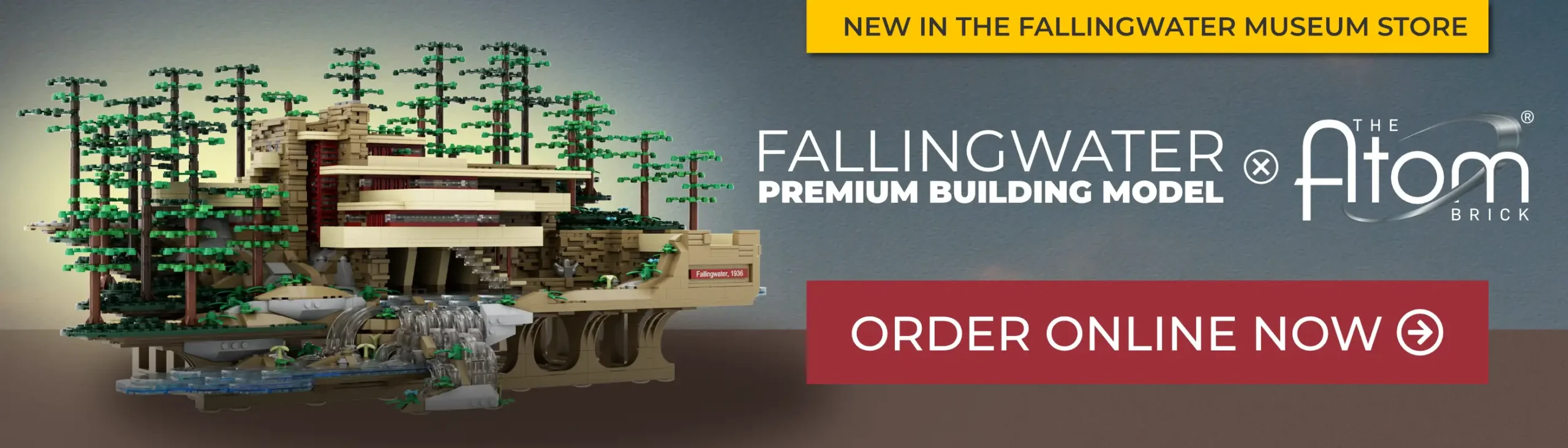 A promotional banner of a building block model of a modern house (Fallingwater) next to text announcing the product launch of the Fallingwater model by The Atom Brick.