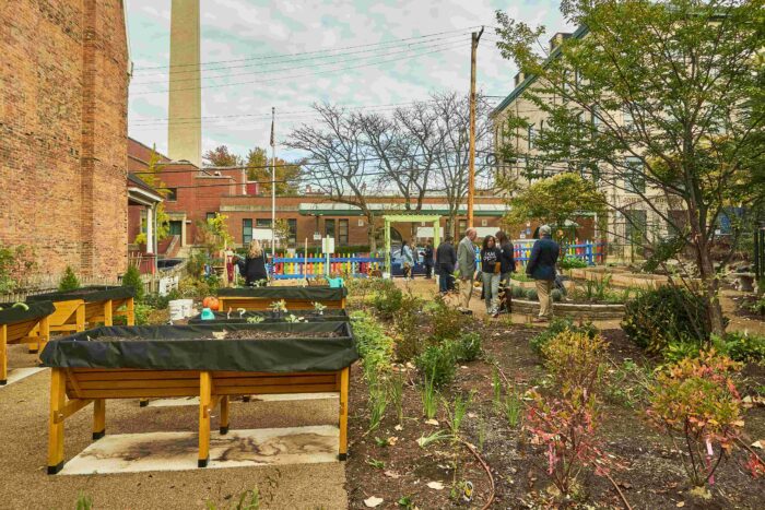 Community members attend the Page Street Community Accessible Vegetable Garden opening in Pittsburgh.