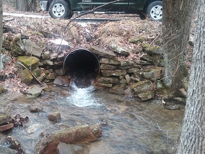 A culvert on a tributary to Laurel Creek did not allow easy aquatic organism passage and caused water to wash over the road. 
