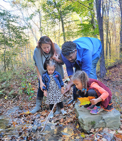 Family on a hike at Toms Run
