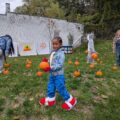 Student at Ribbon-Cutting, Pumpkin Patch for New Natural Play Space at PPS Spring Garden Early Childhood