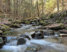 Snow covered field and farmhouse in Western PA