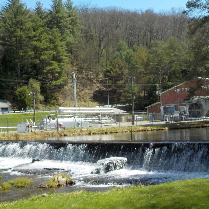 Callen Run dam, approximately 5 deet high, near the Heath Township Sportsmen's club fish hatchery, with high water flowing over the dam