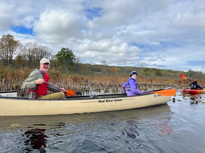 Andy Zadnik and child in canoe at Lake Pleasant Conservation Area